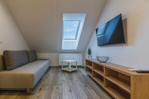 Classic Apartment, Balcony | Living area | 43-inch LED TV with cable channels - Domačija Log v Bohinju (Bohinj)