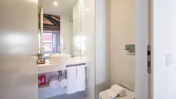 Comfort Studio | Bathroom | Hair dryer, bathrobes, towels, soap
