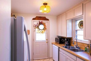 Fridge, oven, spices, dining tables