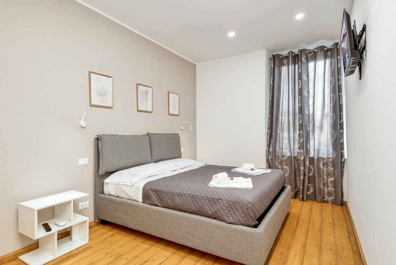 2 dormitorios, tabla de planchar con plancha, wifi y ropa de cama