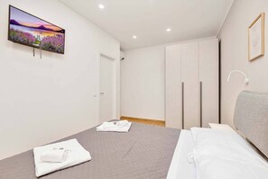 2 slaapkamers, een strijkplank/strijkijzer, wifi, beddengoed