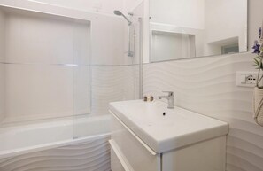 Hair dryer, bidet, towels