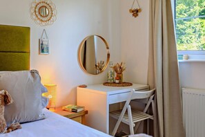 2 dormitorios, tabla de planchar con plancha, wifi gratis y ropa de cama