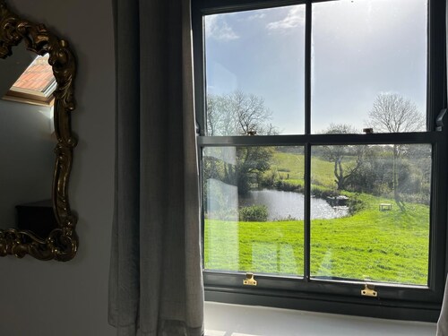 Family Friendly Brewery Conversion on Jurassic Coast with own swimming lake.