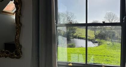 Family Friendly Brewery Conversion on Jurassic Coast with own swimming lake.