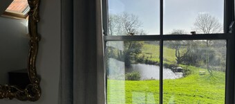 Family Friendly Brewery Conversion on Jurassic Coast with own swimming lake.