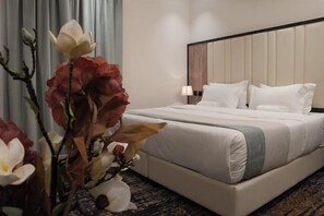 Deluxe appartement, 2 slaapkamers | Lakens van Egyptisch katoen, luxe beddengoed, donsdekens