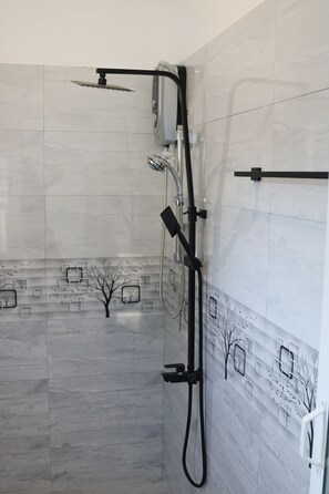 Apartament Deluxe, 2 dormitoris, no fumadors | Bany | Dutxa, tovalloles, sabó i xampú 