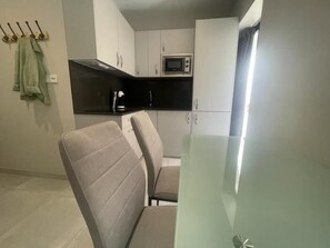 Fridge, microwave, coffee/tea maker, toaster