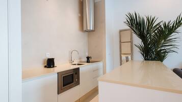 Fridge, microwave, coffee/tea maker, toaster