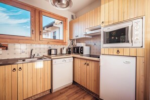 Refrigerador, microondas, horno y lavavajillas 