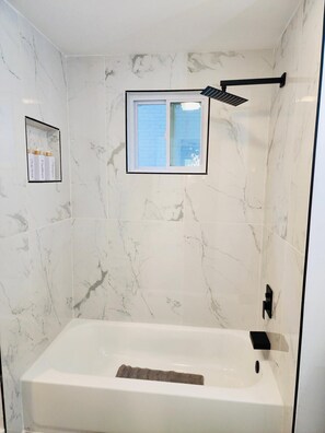 Hair dryer, towels, soap, shampoo