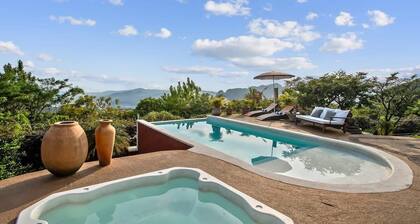 Tranquil 5BR Retreat with Infinity Pool & Lush Mountain Views