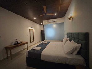 Premium bedding, down duvets, pillow-top beds, rollaway beds