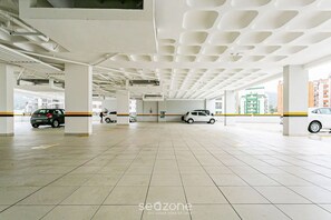 A spacious parking garage with multiple levels and a modern design.