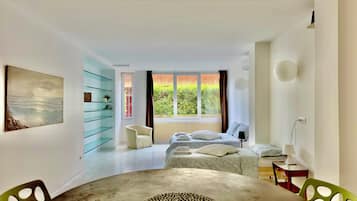 Classic Apartment, Courtyard View | Living area | 42-inch Smart TV with digital channels, Netflix, Hulu