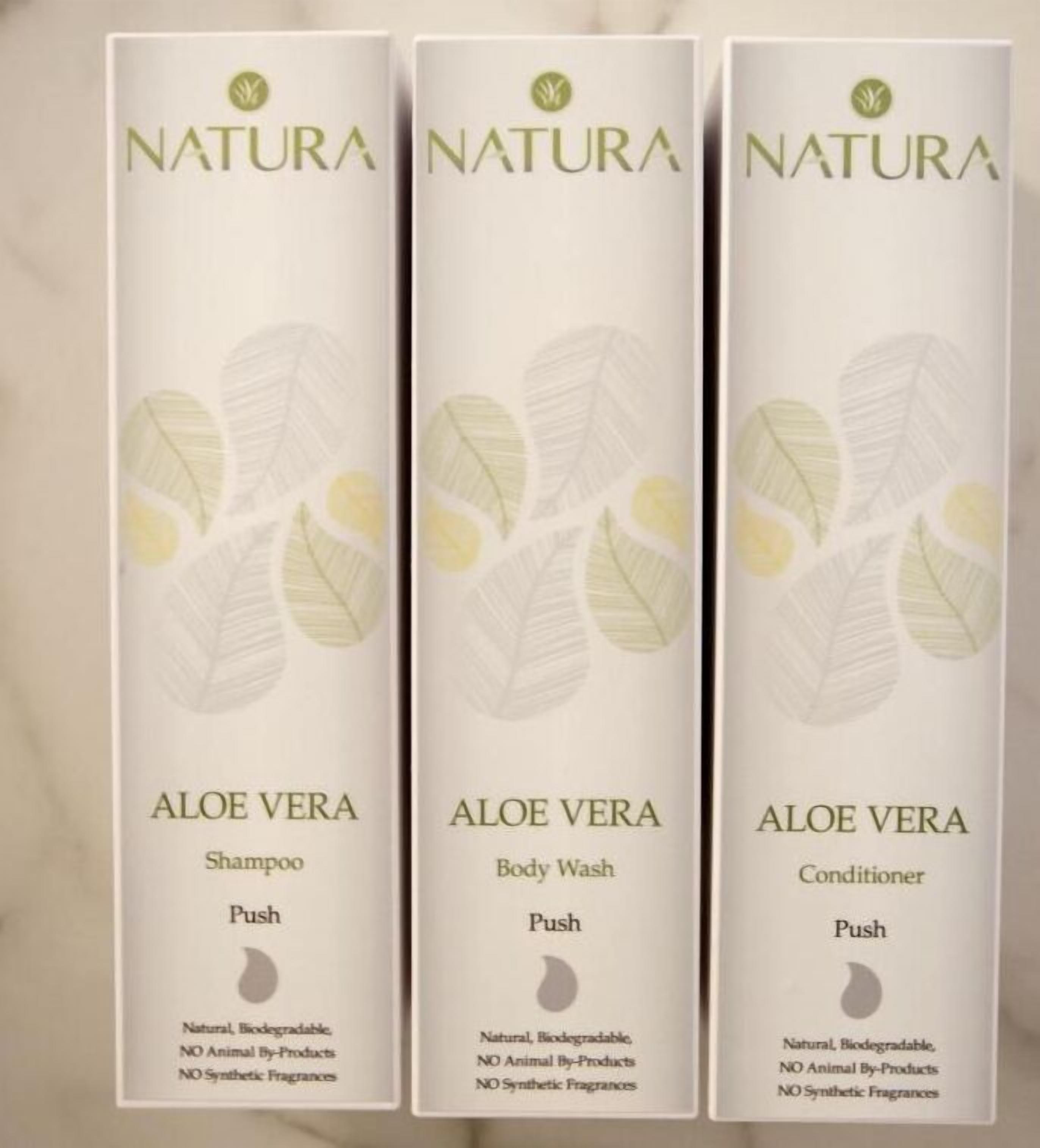 Three Natura product boxes: Aloe Vera Shampoo, Body Wash, and Conditioner.