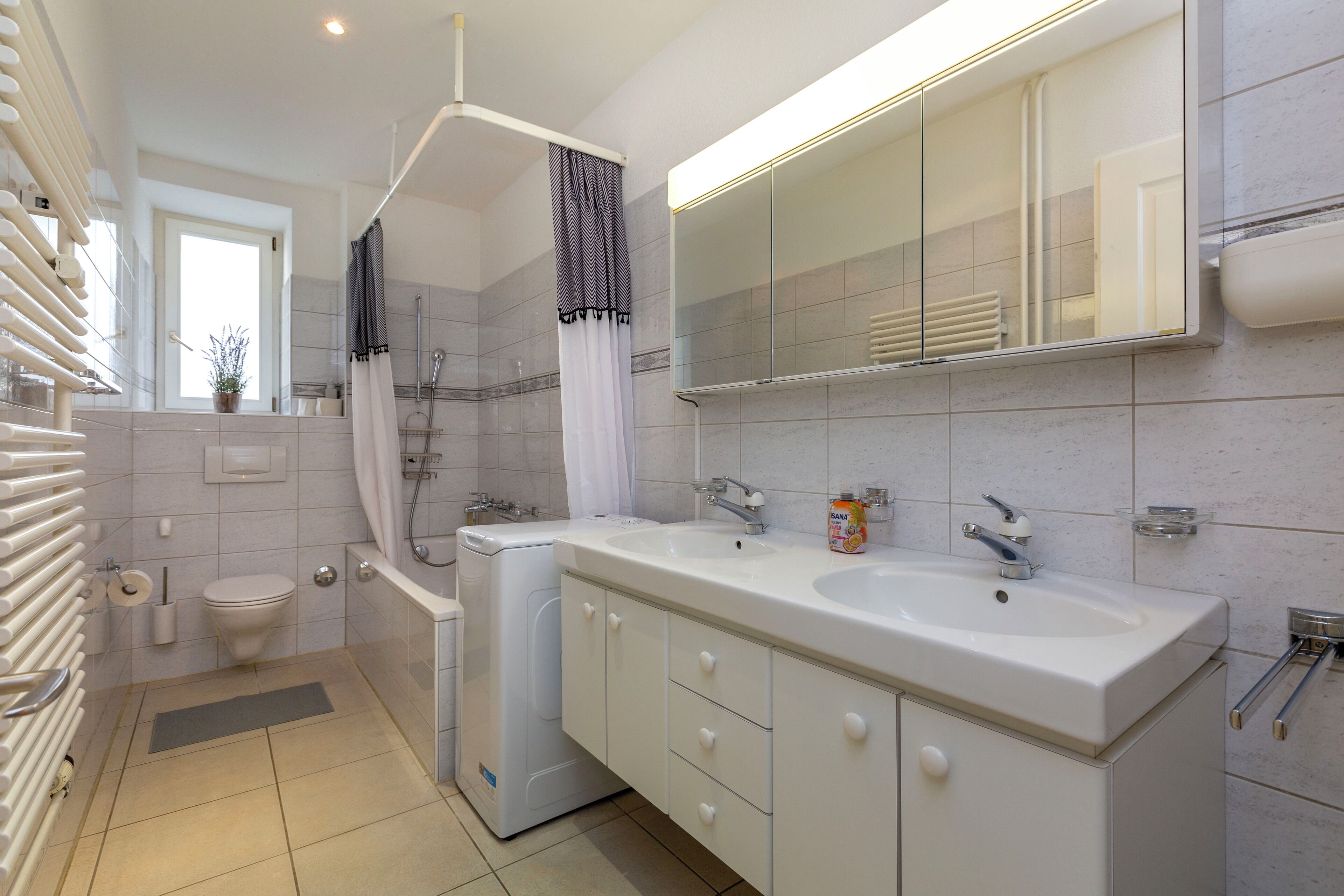 Luxury Apartment, Balcony, City View | Bathroom | Combined shower/tub, free toiletries, towels, toilet paper