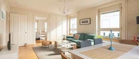 Superior Apartment, City View | Living room | 32-inch Smart TV with digital channels, Netflix, streaming services