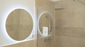 Shower, bidet, towels, soap