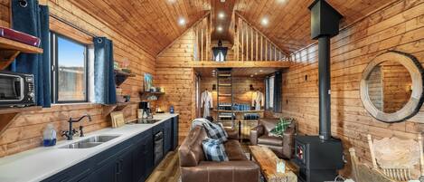 Cabane Luxe | Coin séjour | Station d'accueil iPod, chauffage par le sol