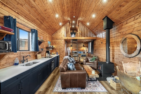 Luxury Cabin | Living area. River Retreat Kananaskis
