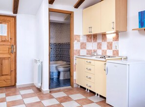 Fridge, stovetop, cookware/dishes/utensils