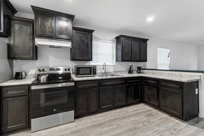 Microwave, oven, stovetop, cookware/dishes/utensils