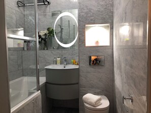 Hair dryer, towels, soap, shampoo