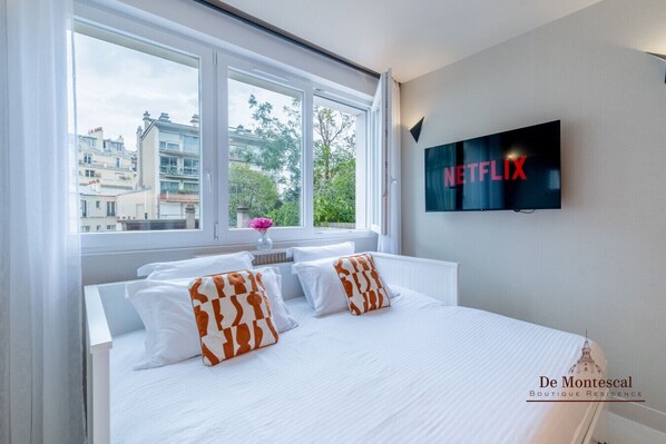 Fer et planche à repasser, Wi-Fi gratuit, draps fournis