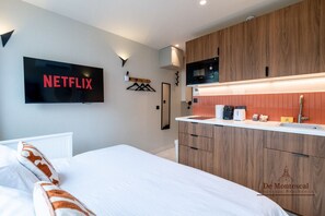 Fer et planche à repasser, Wi-Fi gratuit, draps fournis