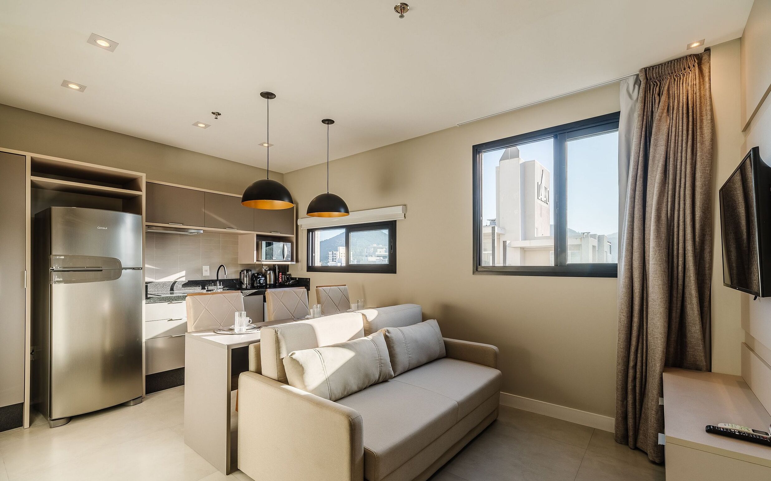 Basic Apartment | Living area | 32-inch Smart TV with digital channels, ping pong