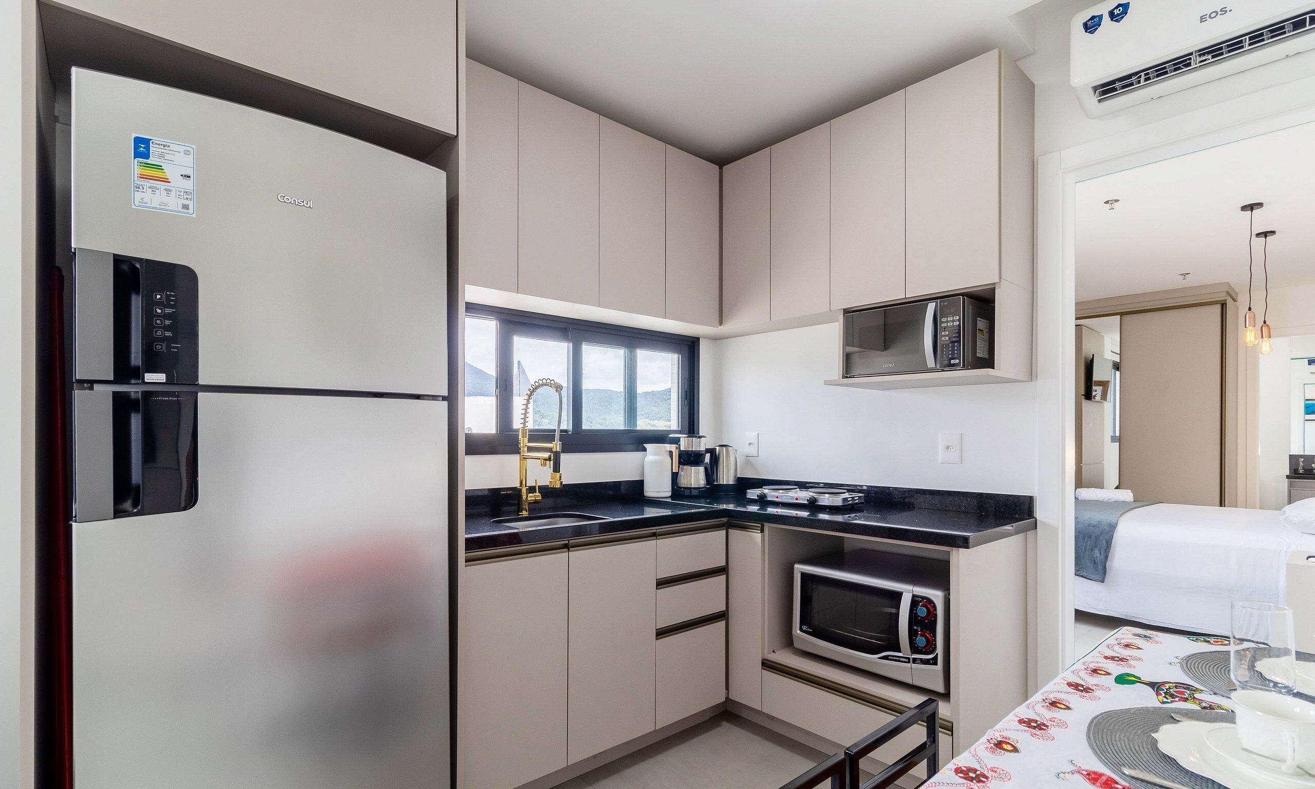 Basic Apartment | Private kitchen | Microwave, cookware/dishes/utensils