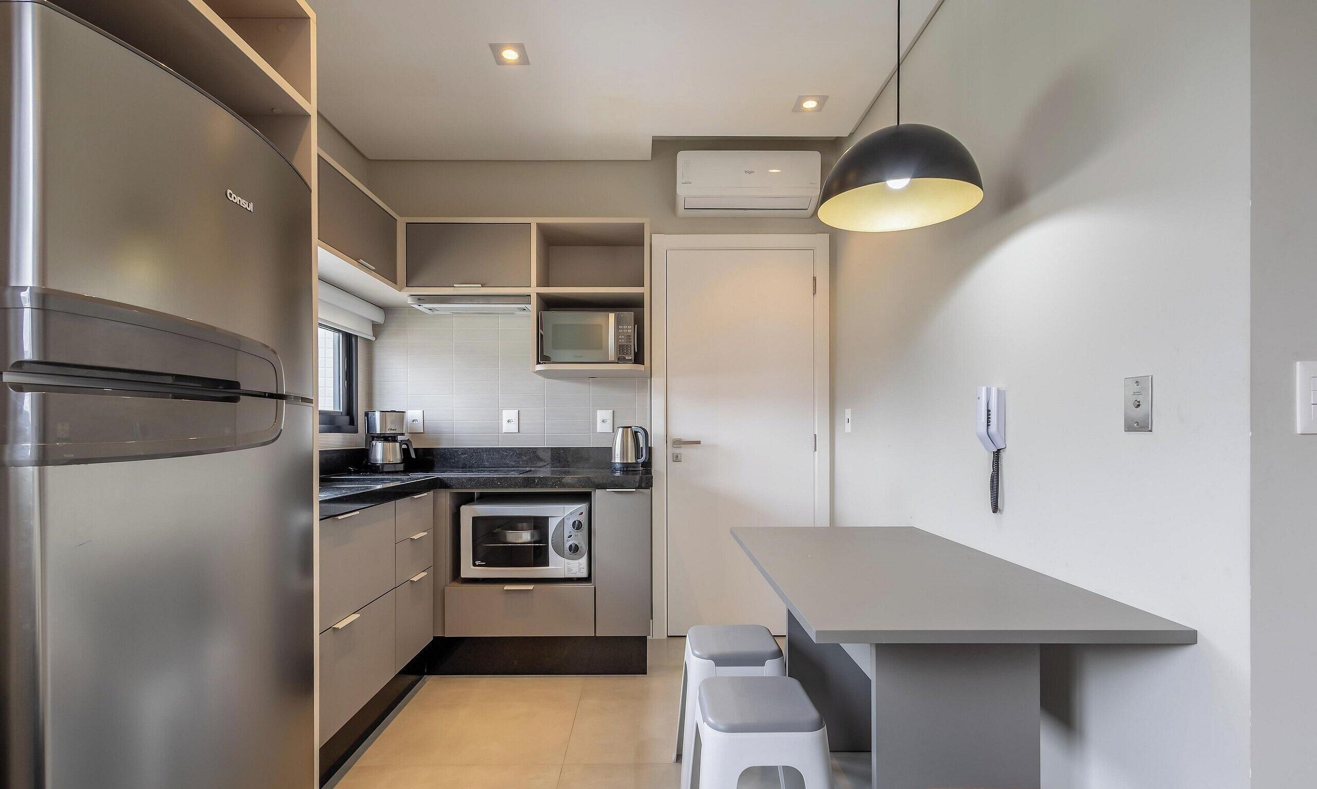 Basic Apartment | Private kitchen | Microwave, cookware/dishes/utensils