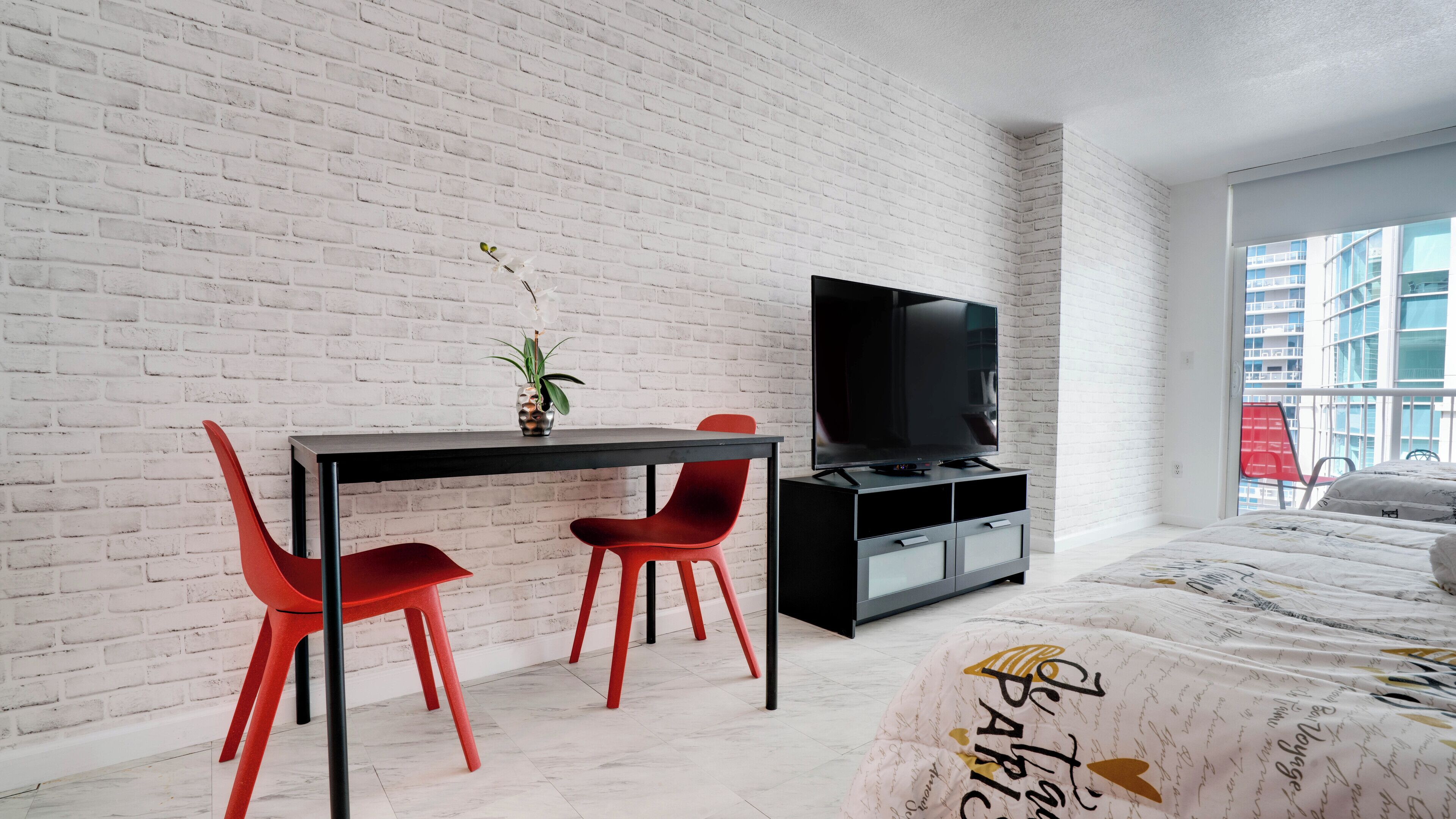 Design Studio, City View | Living area | 60-inch Smart TV with cable channels, table tennis