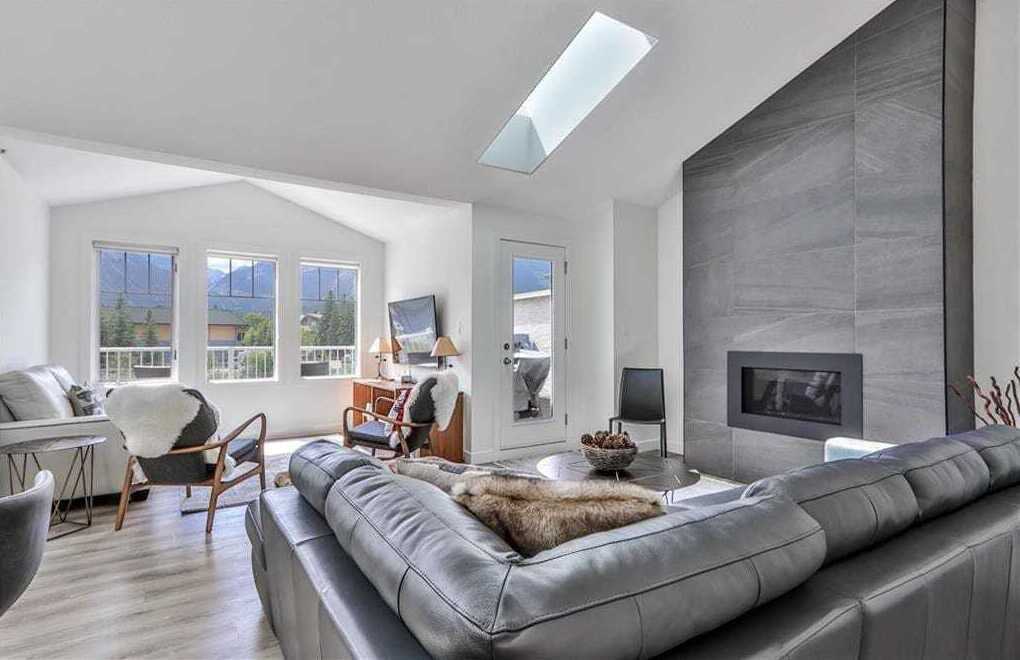 TV, fireplace, books, offices