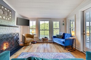 Smart TV, fireplace, books