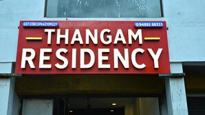 A sign for Thangam Residency with a contact number and GST number. - Thangam Residency (Tiruvannamalai)