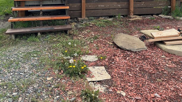 A small, single-story wooden cabin with a porch, a door, and a window. - Charming bungalow with AC and WiFi in a private rural part of Billings.  (Billings)