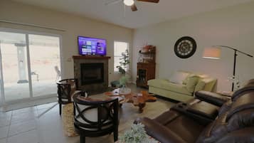 Smart TV, fireplace, books