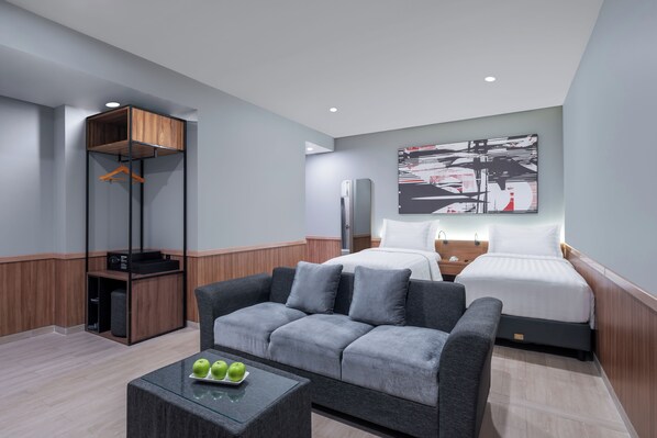 Deluxe kamer | Een kluis op de kamer, een laptopwerkplek, gratis wifi, beddengoed