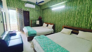 Deluxe Quadruple Room, Mountain View | In-room safe, desk, laptop workspace - Hotel Garden City Bandarban (Bandarban)