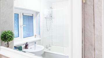 Hair dryer, towels, soap, toilet paper
