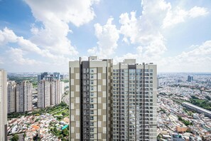 Deluxe Apartment, 1 Bedroom, Balcony, Courtyard View | Room amenity - Vinhomes Central Park Apartment by Hava  (Ho Chi Minh City)