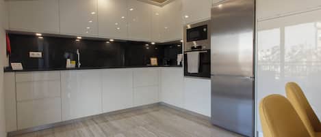 Luxury Penthouse, Balcony | Private kitchen | Espresso maker, coffee/tea maker, electric kettle, toaster