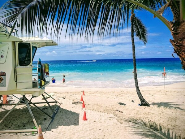 On the beach, sun loungers, beach towels