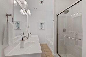 Shower, jetted tub, hair dryer, towels