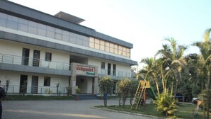 A modern building with a sign reading "Salyadi". - Sahyadri Guest House (Talasri)