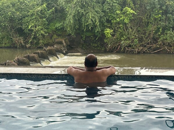 Pool - 3-bedroom farmhouse in charming Kharivali with AC, WiFi. Enjoy a cozy stay (Kharivali)