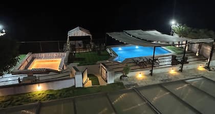3-bedroom farmhouse in charming Kharivali with AC, WiFi. Enjoy a cozy stay
